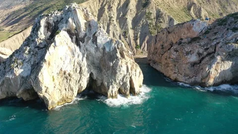 Dramatic Rocky Formation and Turquoise Mediterranean Sea, Northern Morocco Stock Footage 345251909