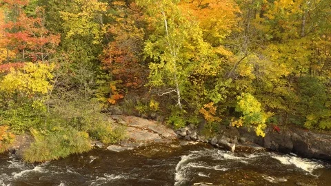 Dramatic rocky formation guide the water of a river down the path Stock Footage 119186804