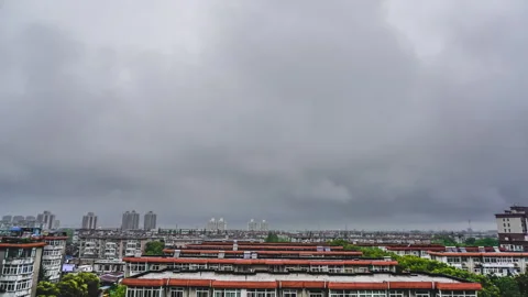 Dramatic Rolling Storm Clouds Building Across Sky 4K Timelapse Video stock 320606056