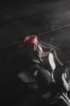 Dramatic Rose on a Dark Surface Highlighted by Soft Light Stock Photos