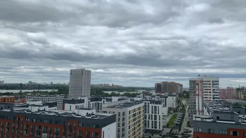 Dramatic runing cloud over the city. Time-lapse footage Stock Footage 131251585