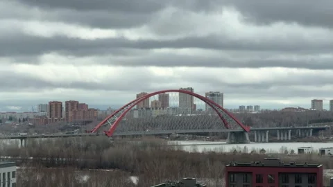 Dramatic runing cloud over the red city arch bridge. Timelapse footage Stock Footage 272464746