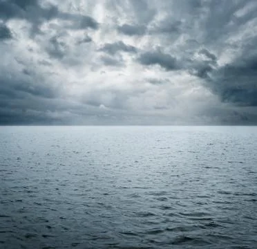 Dramatic scene of ocean befre storm Stock Photos