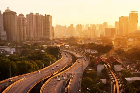 Dramatic scenery of elevated highway heading towards Kuala Lumpur city centre Stock Photos