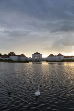 Dramatic scenery of post storm sunset of Nymphenburg palace in Munich Germany. Stock Photos
