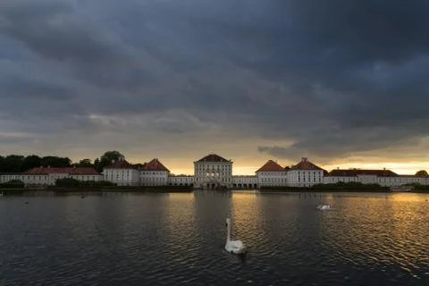 Dramatic scenery of post storm sunset of Nymphenburg palace in Munich Germany. Foto stock