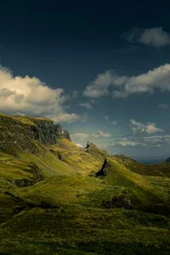 Dramatic Scottish Highlands scene with rugged hills and cloudy sky Stock Photos