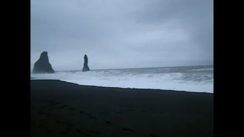 Dramatic sea stacks at the black sand beach, Iceland Stock Footage 327955641