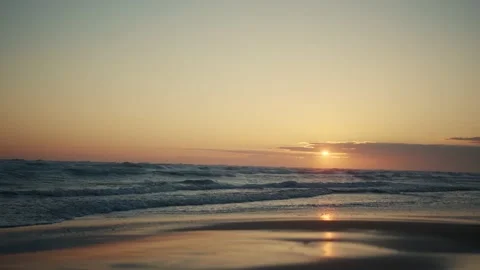 Dramatic sea sunrise. Burning sky and shining golden waves. Stock-Footage 157587645
