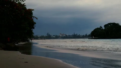 Dramatic sea sunrise. A burning sky and shining golden waves Stockbeeldmateriaal 239856828