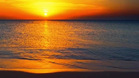 Dramatic sea sunrise. Burning sky and shining golden waves. Stock Footage 276608407