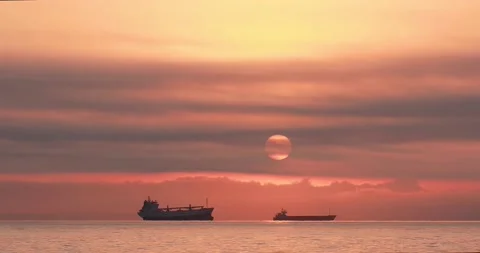 Dramatic sea sunrise. Two large ships in the sea. Stock Footage 165361426