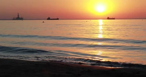 Dramatic sea sunrise. Two large ships in the sea. Stock Footage 165361429