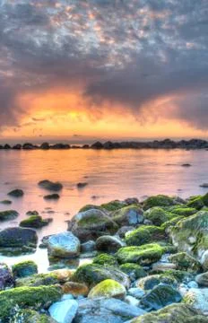 Dramatic sea sunset Stock Photos