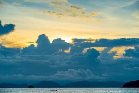 Dramatic seascape in the evening, dark clouds over the sea Stock Photos