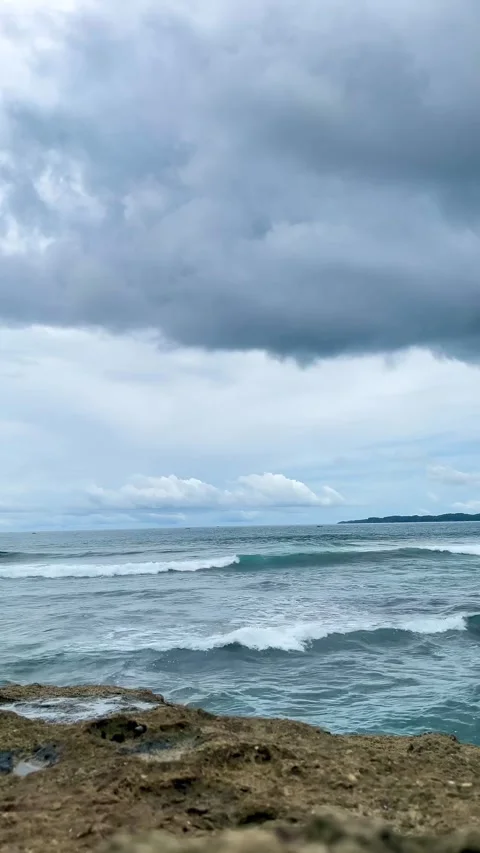 Dramatic Seascape View with Large Waves Under Dark Overcast Sky Stock Footage 340897359