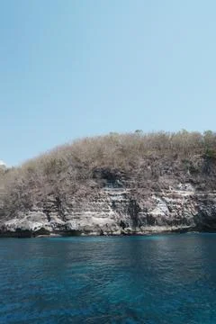 Dramatic Seaside Cliffs with Lush Vegetation Stock Photos