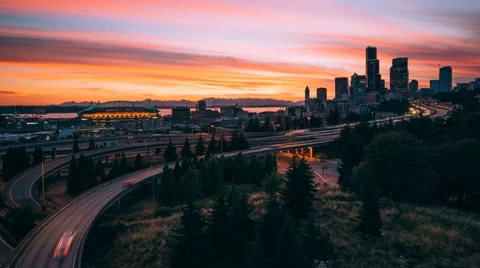 Dramatic Seattle Skyline in motion at sunset 4K Timelapse Stock Footage 62964499