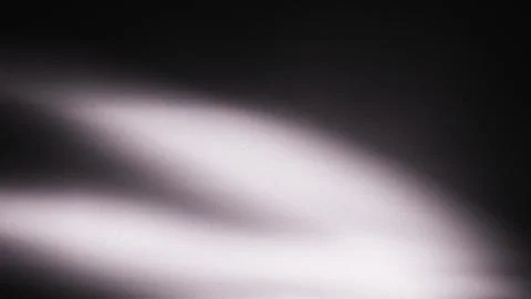 Dramatic shadows dance across dark background with bright light Stock Illustration