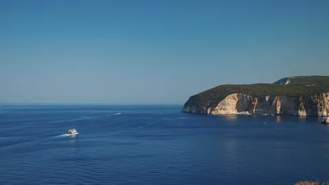 Dramatic shore with cliffs and boat on the sea Stock Footage 115108154