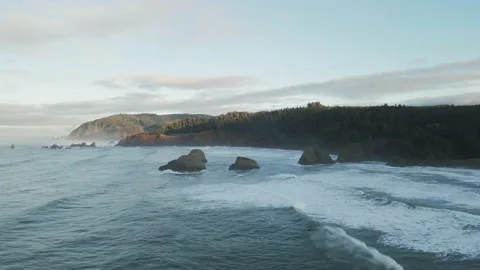 Dramatic shot of Cannon Beach due to cloudy mist day, Oregon Stock Footage 234648088