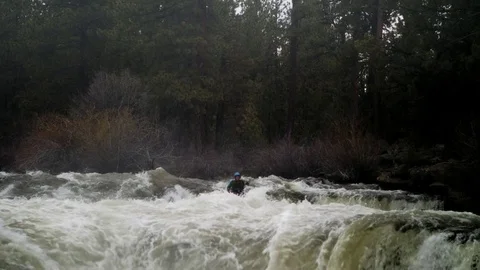 Dramatic shot Kayaker Shooting Waterfalls Stock Footage 83203610