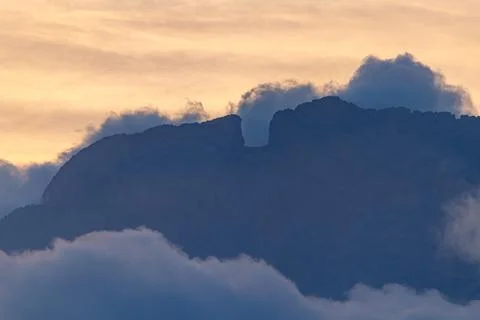 Dramatic Silhouette of Puig Campana's Summit Stock Photos