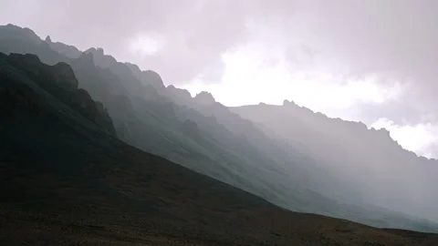 Dramatic Silhouettes of Rugged Peaks Stock Footage 308989738