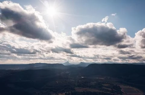 Dramatic skies over rolling hills in French countryside Stock Photos