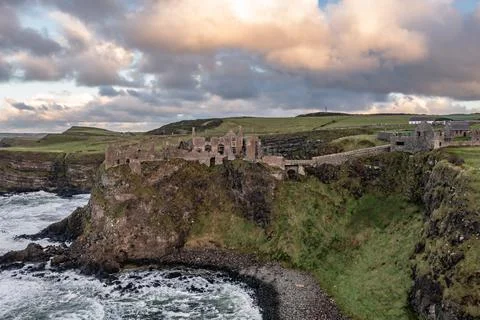 Dramatic sky above Dunluce Castle, County Antrim, Northern Ireland. Stock Photos