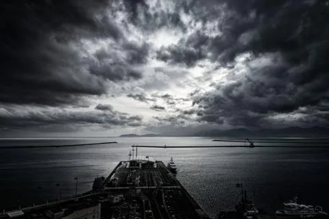 Dramatic sky above the harbor Stock Photos