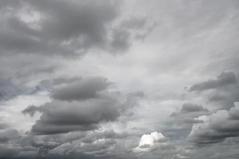 Dramatic sky and bad weather with dark clouds Stock Photos