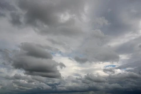 Dramatic sky and bad weather with dark clouds Stock Photos
