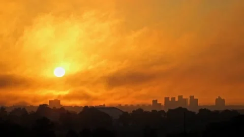 Dramatic Sky and Cityscape with Clouds of Fog at Sunrise Video stock 203912967