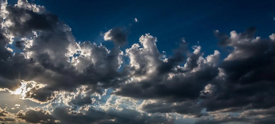 Dramatic sky and cloudy before a storm at sunset Stock Photos
