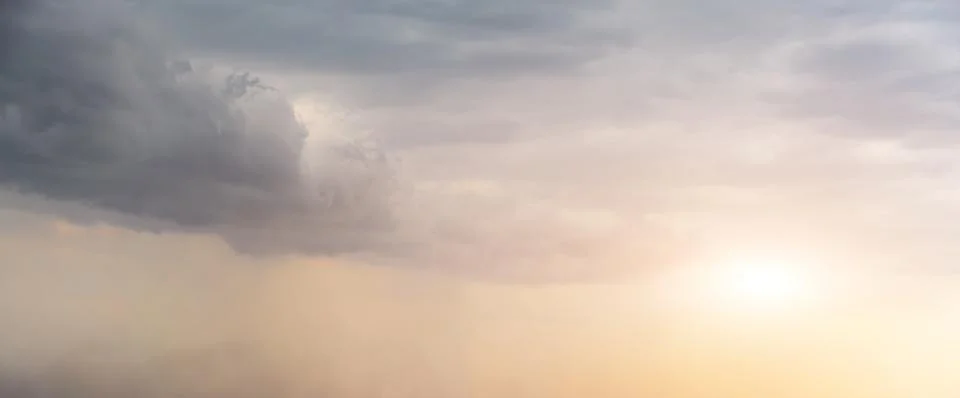 Dramatic Sky Background. Panoramic view of Stormy Clouds in Dark sky Stock Photos