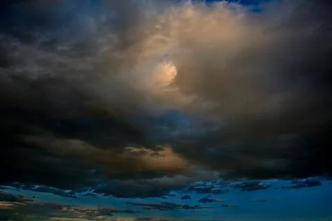 Dramatic Sky Background. Stormy Clouds in Dark Sky. Moody Cloudscape. Stock Photos