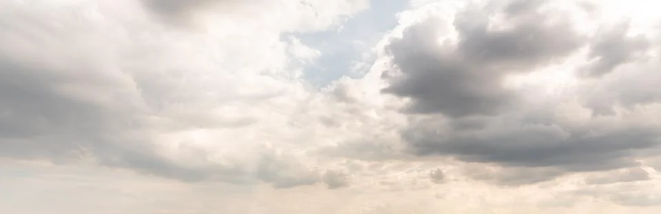 Dramatic sky background. Stormy clouds in dark sky. Moody cloudscape Stock Photos
