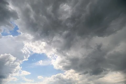 A Dramatic Sky with Beautiful Clouds and Various Shades of Blue Hues Filling the 스톡 사진