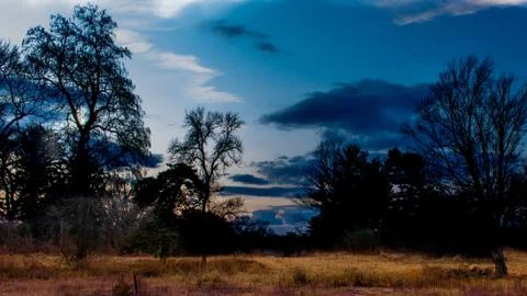 A Dramatic Sky at Blue Hour Over an Autumn Field Stock Photos