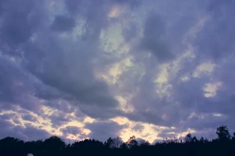 Dramatic sky with cloud at sunset. Nature background. Stock Photos