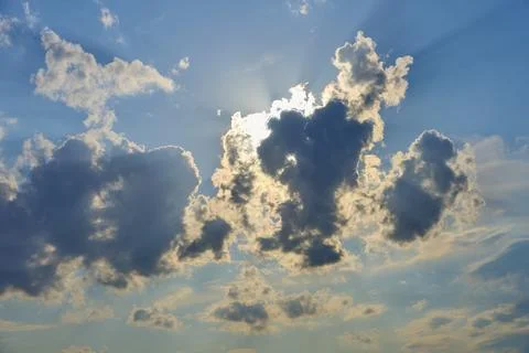 Dramatic sky with clouds and sun rays permeate the clouds, summer, Miltenberg, Stock Photos
