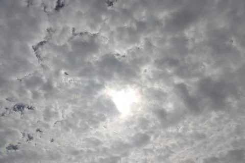 Dramatic Sky with Clouds Covering the Sun Stock Photos