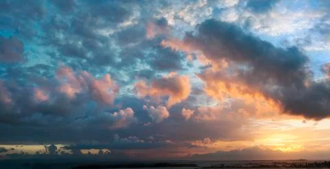Dramatic sky with clouds at sunset Stock Photos