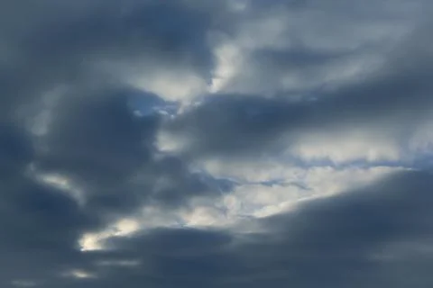 Dramatic sky with clouds at sunset 写真素材