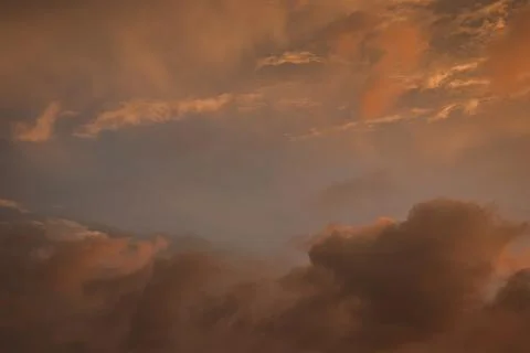 Dramatic sky with clouds at sunset Stock Photos