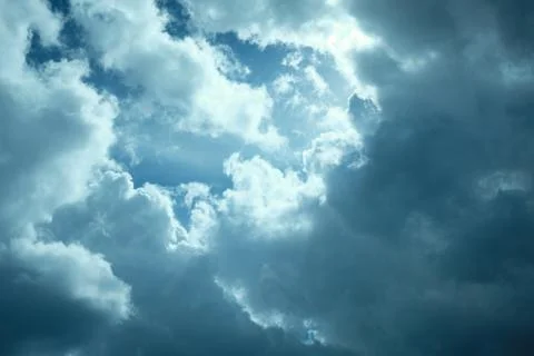 Dramatic sky covering the sun in summer 写真素材