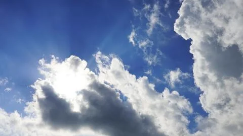 Dramatic sky, dark clouds on a blue sky, the rays Stock Photos