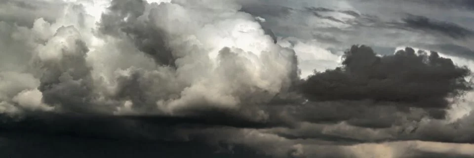 Dramatic sky with dark clouds. Dark rain clouds Stock Photos