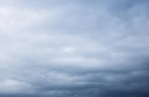 Dramatic sky with dark clouds. Stock Photos
